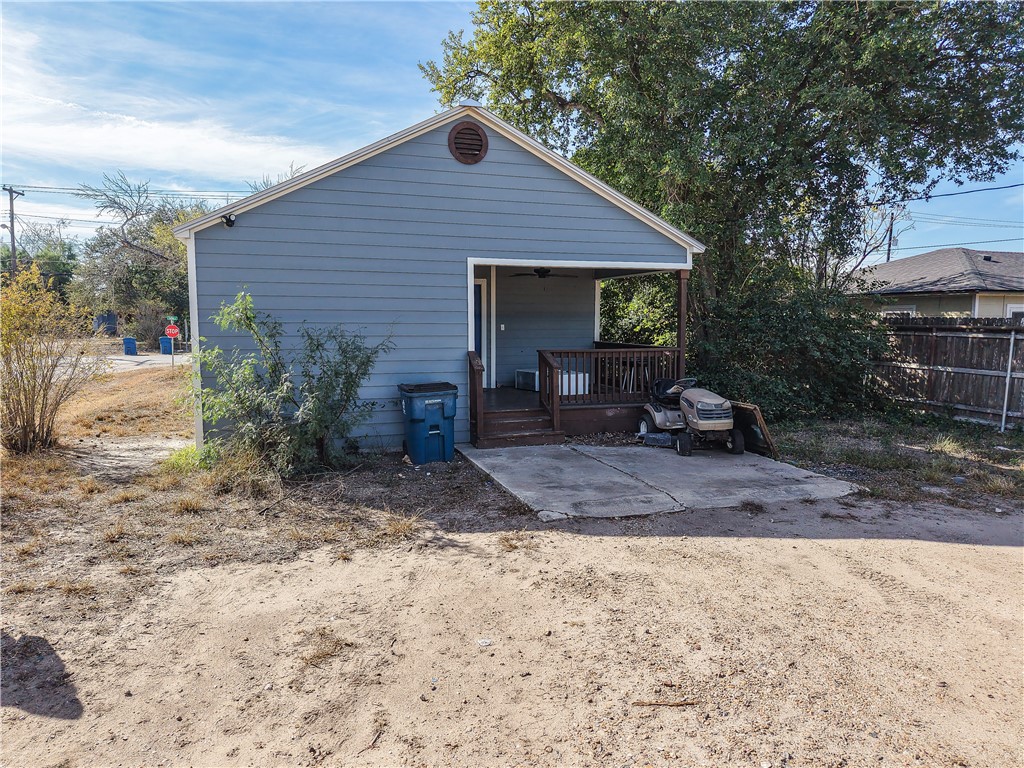 305 East Tullos Street Three Rivers, TX 78071 - Photo 2 of 13 a view of a house with backyard and garden