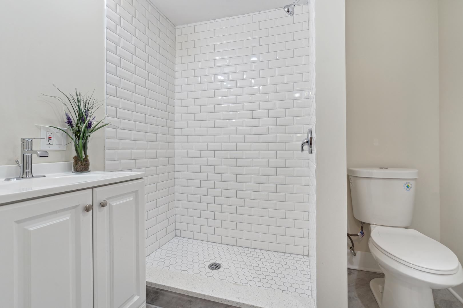 6826 South Prairie Avenue, Unit 1 Chicago, IL 60637 - Photo 16 of 20 a bathroom with a shower a toilet and sink