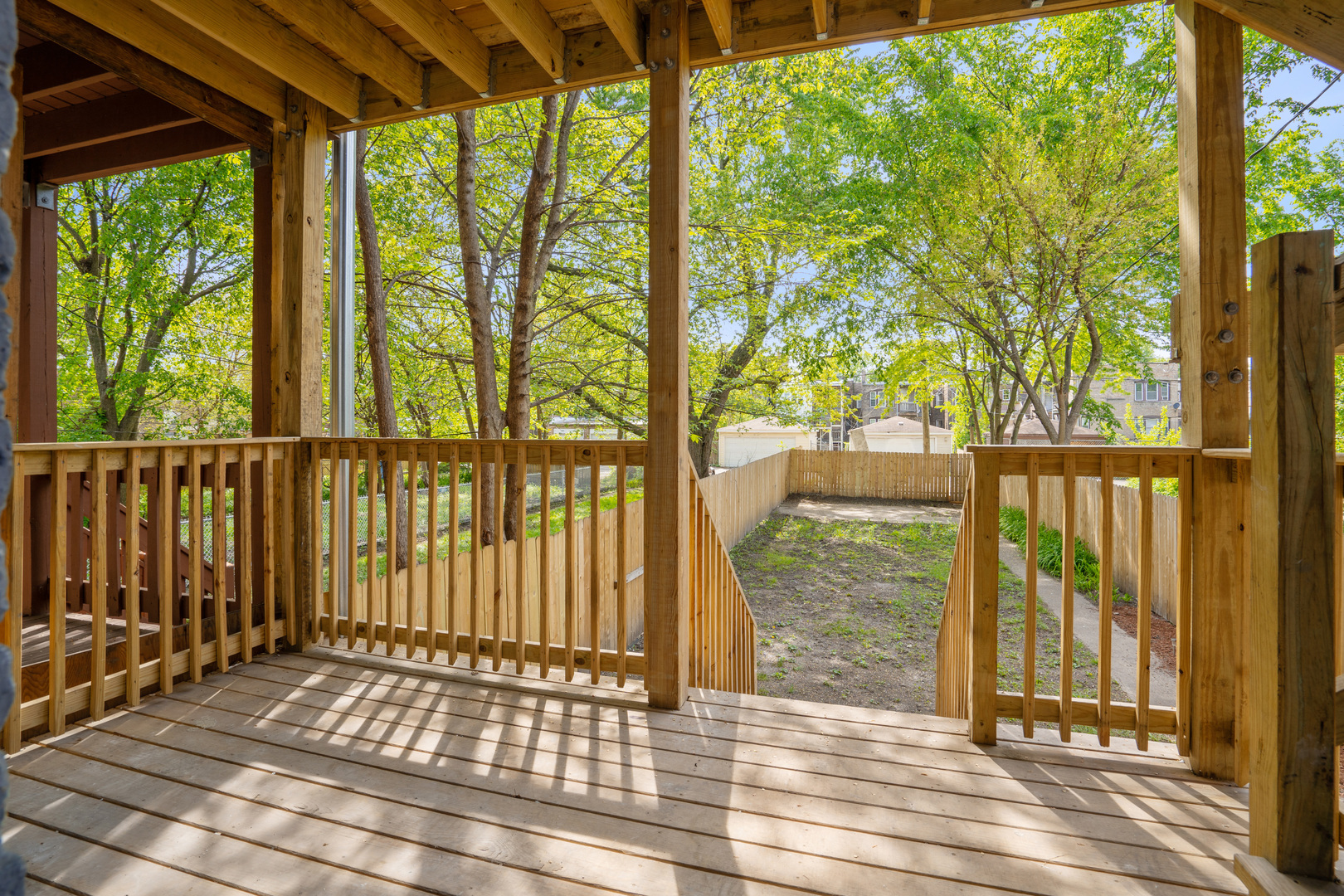 6826 South Prairie Avenue, Unit 1 Chicago, IL 60637 - Photo 18 of 20 a view of a backyard with wooden floor