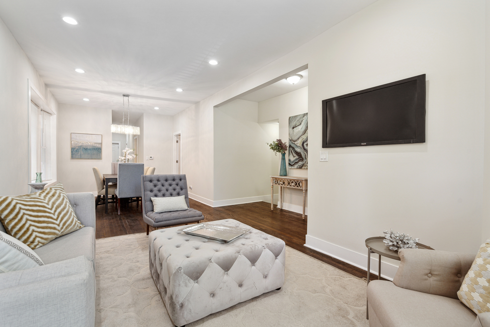 6826 South Prairie Avenue, Unit 1 Chicago, IL 60637 - Photo 5 of 20 a living room with furniture and a flat screen tv