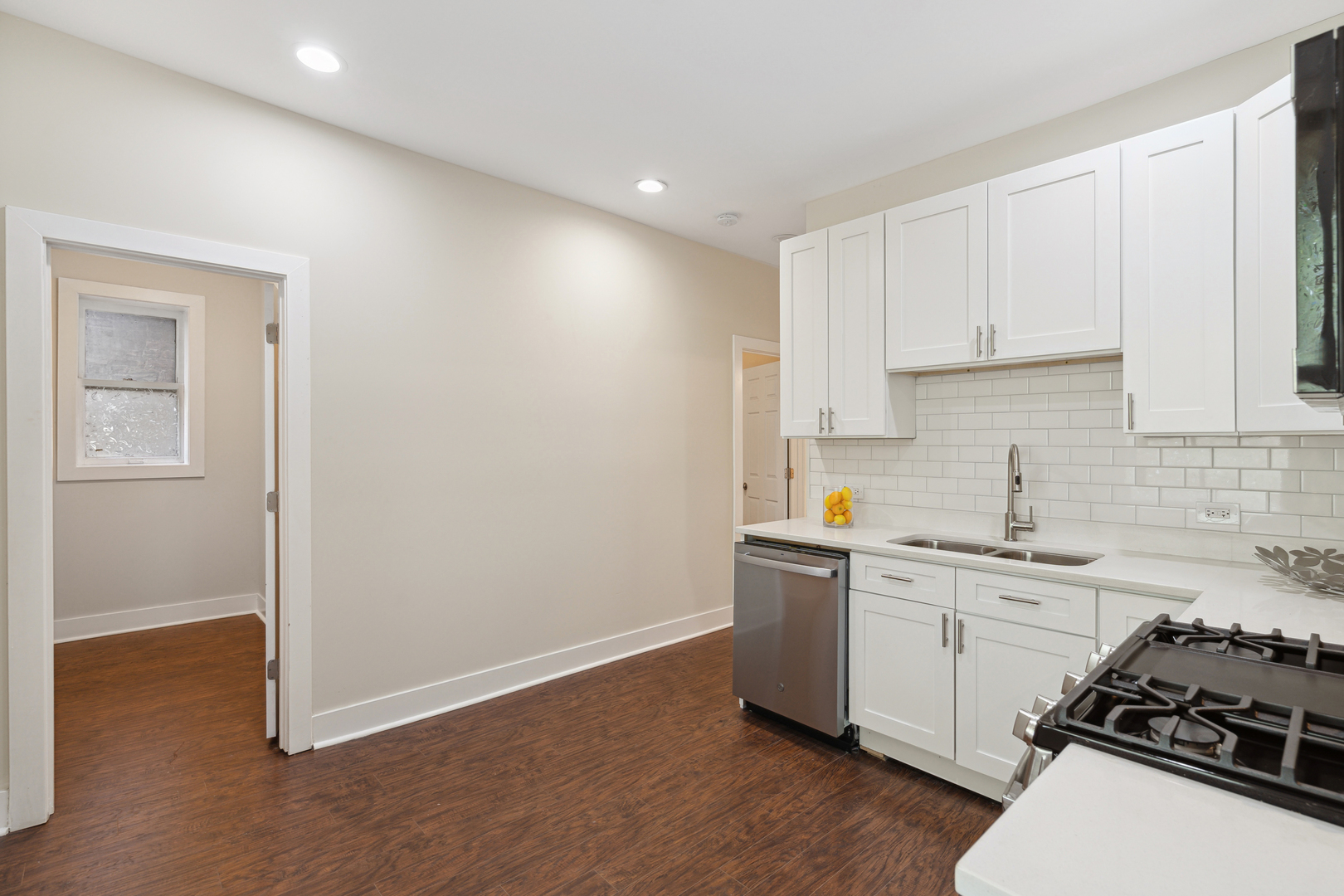6826 South Prairie Avenue, Unit 1 Chicago, IL 60637 - Photo 8 of 20 a kitchen with a sink and cabinets