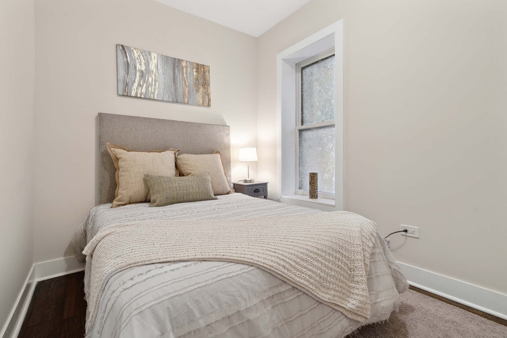 6826 South Prairie Avenue, Unit 1 Chicago, IL 60637 - Photo 10 of 20 a bedroom with a bed and wall painting