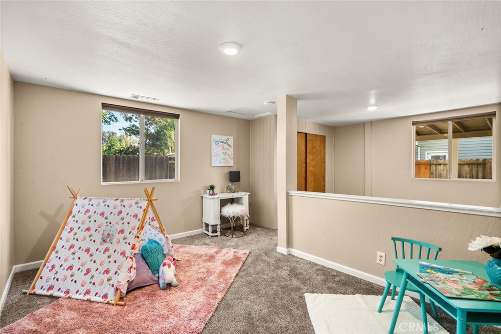 9468 Perkins Road Chico, CA 95928 - Photo 25 of 41 Bonus room. Can be used as a playroom, office or hobby room.