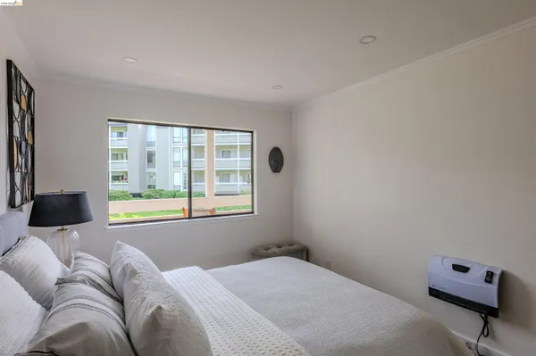 a bathroom with a granite countertop shower toilet and a sink