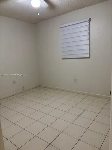 an empty room and a window