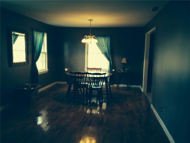 591 Florence Pulaski Road Leoma, TN 38468 - Photo 5 of 12 a view of a dining room with furniture window and wooden floor