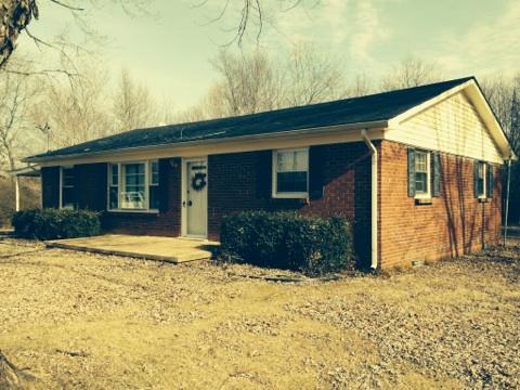 591 Florence Pulaski Road Leoma, TN 38468 - Photo 6 of 12 a view of house with yard