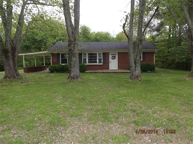 591 Florence Pulaski Road Leoma, TN 38468 - Photo 9 of 12 a view of a house with a yard