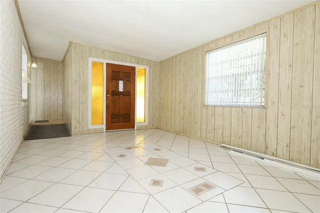 a view of an empty room and window