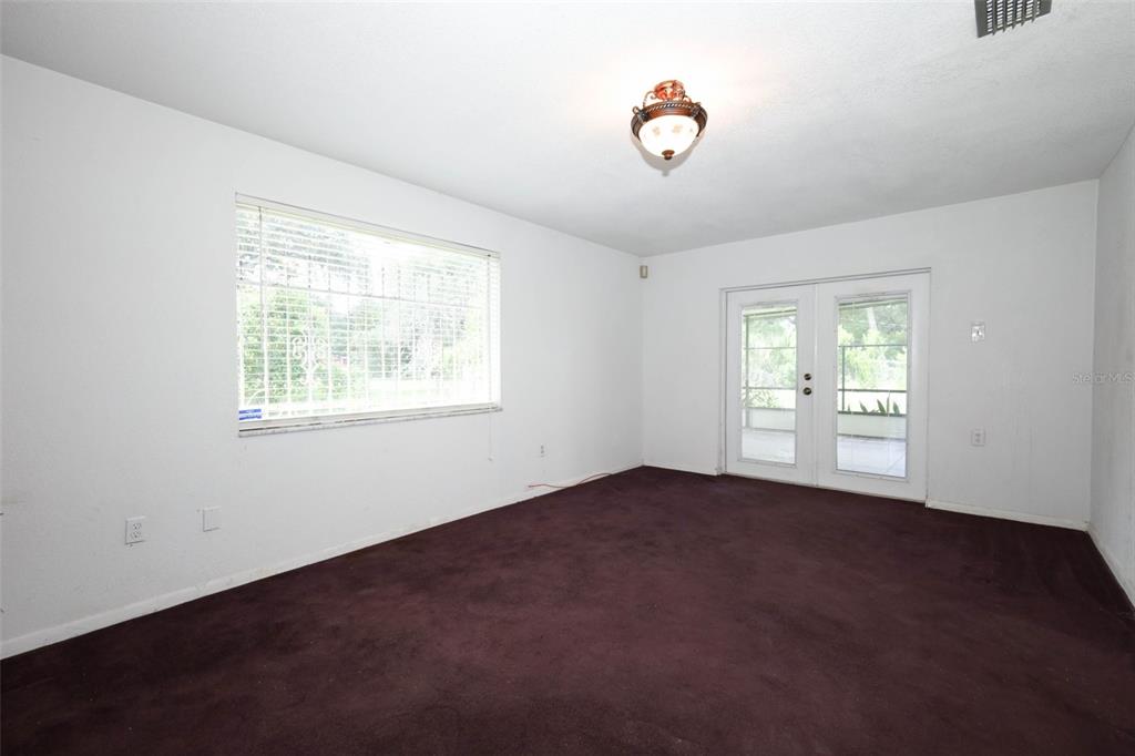 124 Salem Street Altamonte Springs, FL 32701 - Photo 15 of 45 a view of an empty room with a window