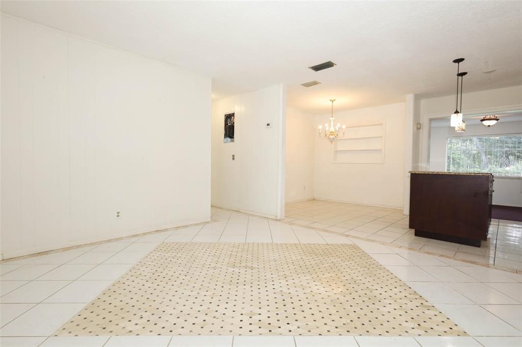 124 Salem Street Altamonte Springs, FL 32701 - Photo 20 of 45 an empty room with kitchen and a window