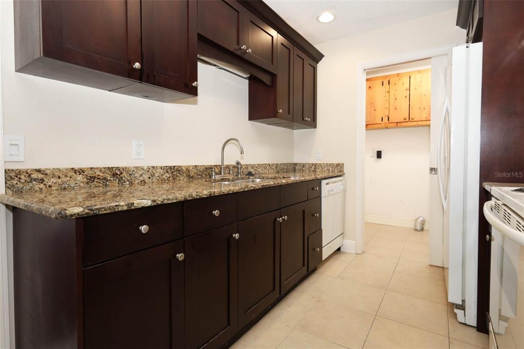 124 Salem Street Altamonte Springs, FL 32701 - Photo 22 of 45 a bathroom with a granite countertop sink and a mirror