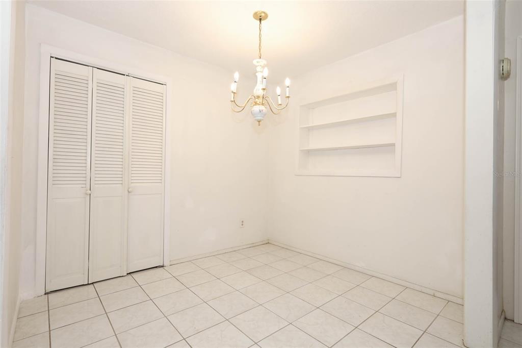 124 Salem Street Altamonte Springs, FL 32701 - Photo 24 of 45 an empty room with chandelier fan
