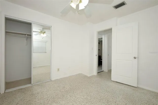 an empty room with a bathroom