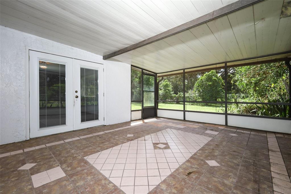 124 Salem Street Altamonte Springs, FL 32701 - Photo 38 of 45 a view of backyard with large windows and stairs