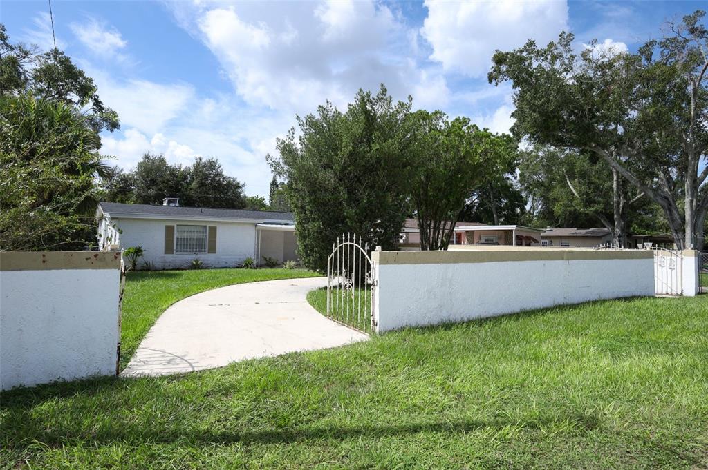 124 Salem Street Altamonte Springs, FL 32701 - Photo 43 of 45 a view of a house with backyard and a tree