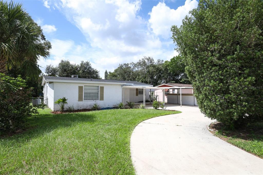 124 Salem Street Altamonte Springs, FL 32701 - Photo 44 of 45 a front view of house with yard and trees