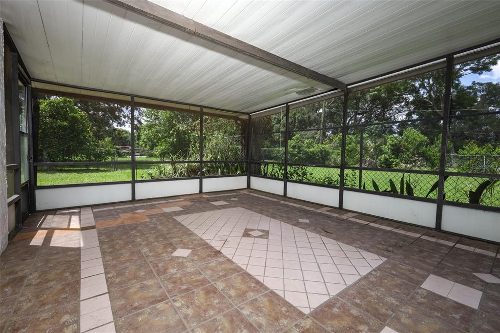 124 Salem Street Altamonte Springs, FL 32701 - Photo 8 of 45 a view of yard with porch and wooden floor