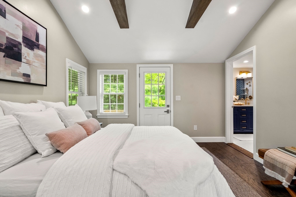 16 Churchill Road Plympton, MA 02367 - Photo 15 of 42 a bedroom with a bed and a couch