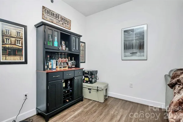 a kitchen with stainless steel appliances a refrigerator and a stove