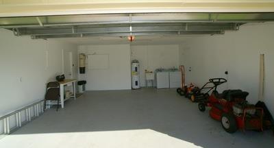 1683 Northwest Spruce Ridge Drive Stuart, FL 34994 - Photo 23 of 23 a view of a room with shelves