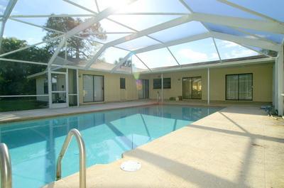 1683 Northwest Spruce Ridge Drive Stuart, FL 34994 - Photo 6 of 23 a view of a house with pool
