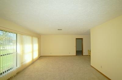 1683 Northwest Spruce Ridge Drive Stuart, FL 34994 - Photo 9 of 23 a view of an empty room
