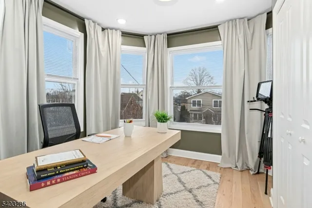 a dining room with large window