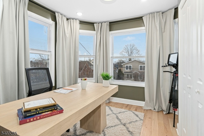 721 Summit Street Linden, NJ 07036 - Photo 17 of 27 a dining room with large window