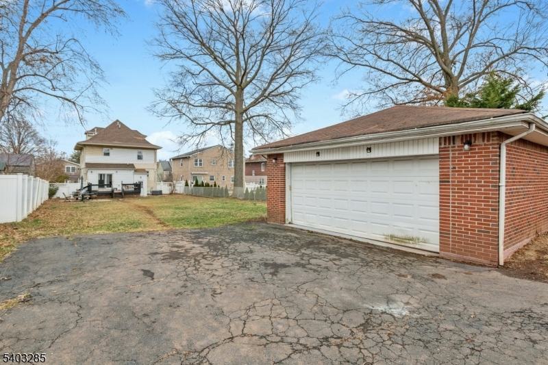 721 Summit Street Linden, NJ 07036 - Photo 23 of 27 a view of a house with a back yard