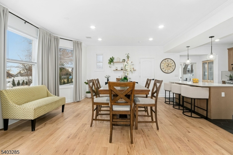 721 Summit Street Linden, NJ 07036 - Photo 5 of 27 a dining room with furniture and wooden floor