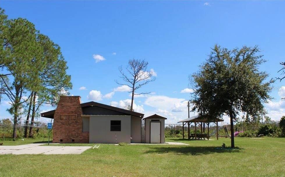 2 Quince Avenue Eustis, FL 32736 - Photo 17 of 22 a view of a house with a yard