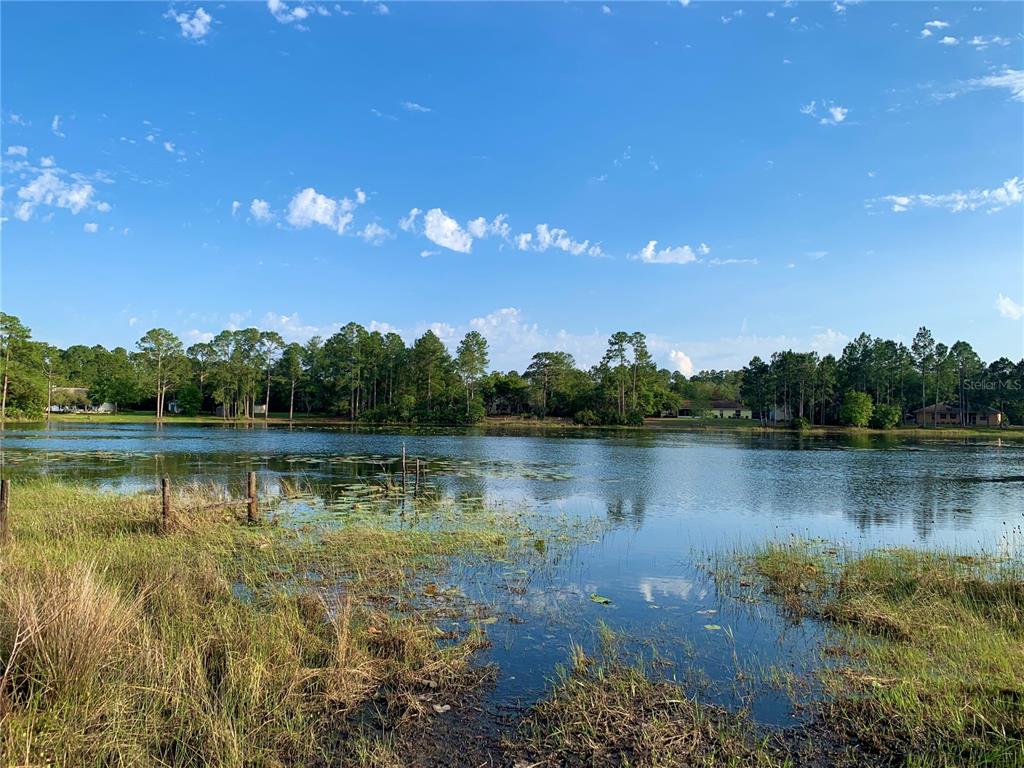 2 Quince Avenue Eustis, FL 32736 - Photo 20 of 22 a view of a lake