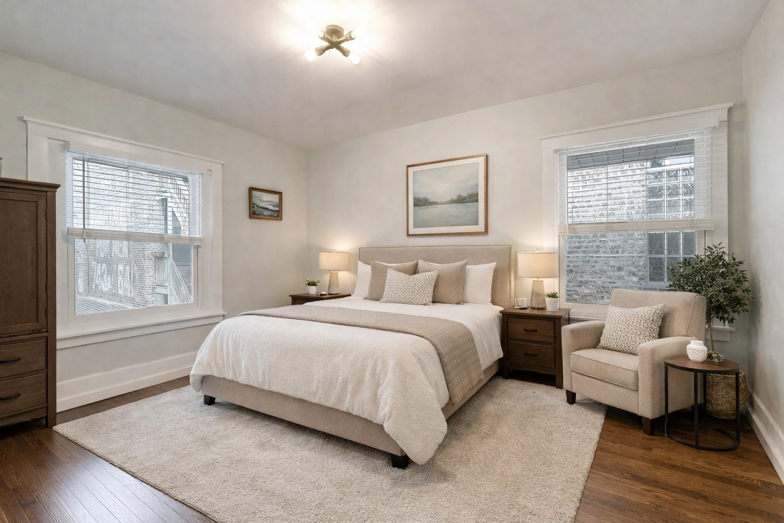 7015 North Sheridan Road Chicago, IL 60626 - Photo 21 of 40 a spacious bedroom with a bed and a couch