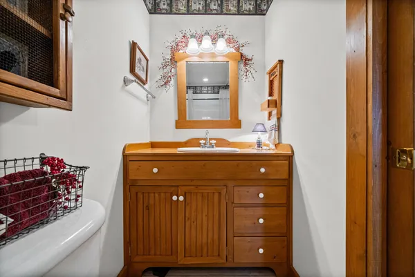 a view of swimming pool from a bathroom