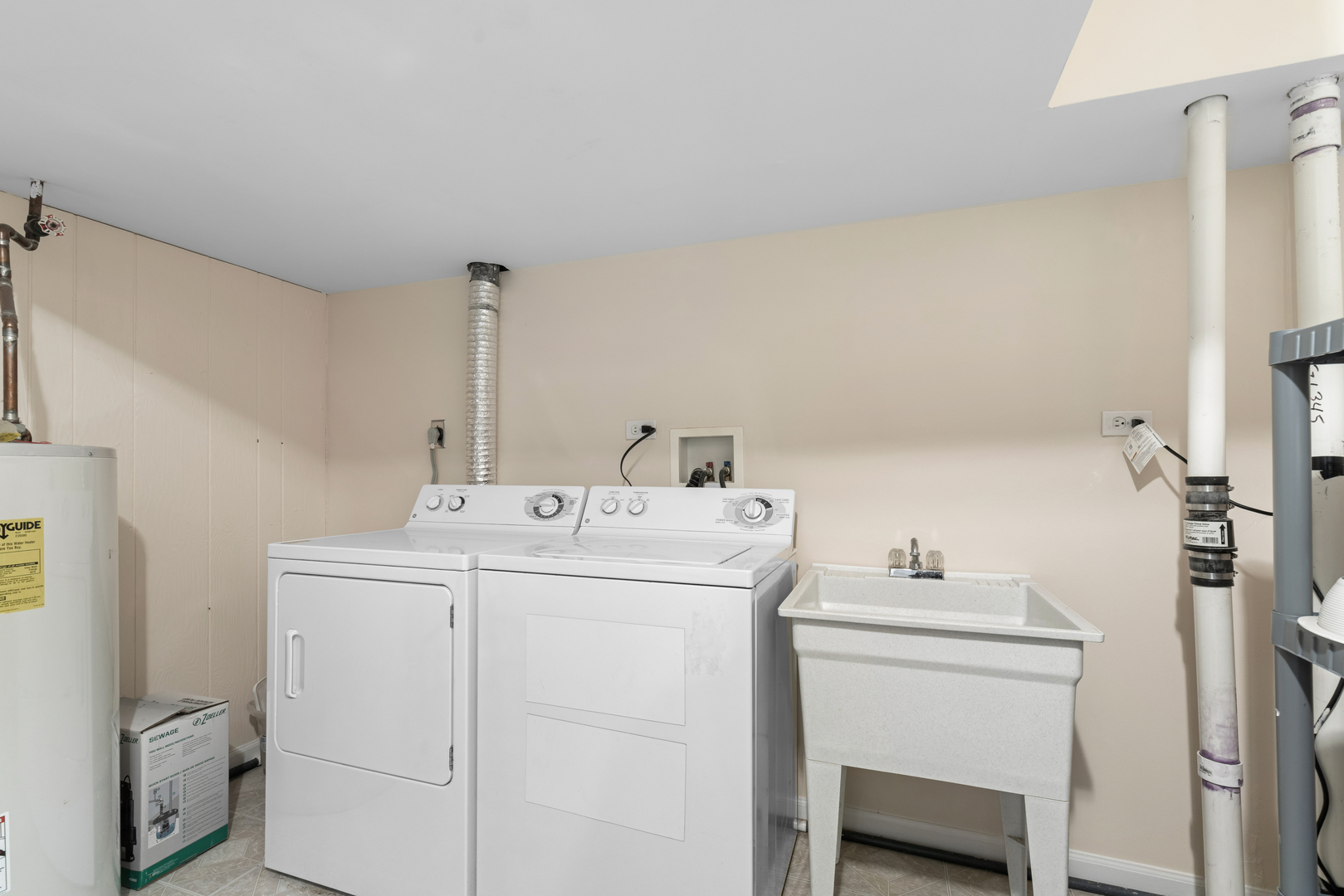 1723 Wildberry Drive, Unit C Glenview, IL 60025 - Photo 26 of 34 a utility room with dryer and washer