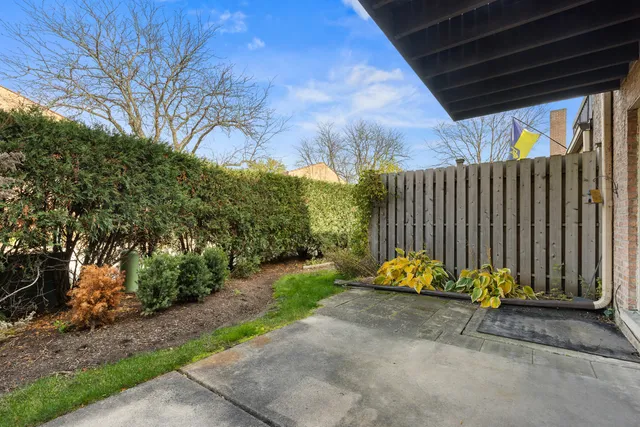 a garden view with a seating space