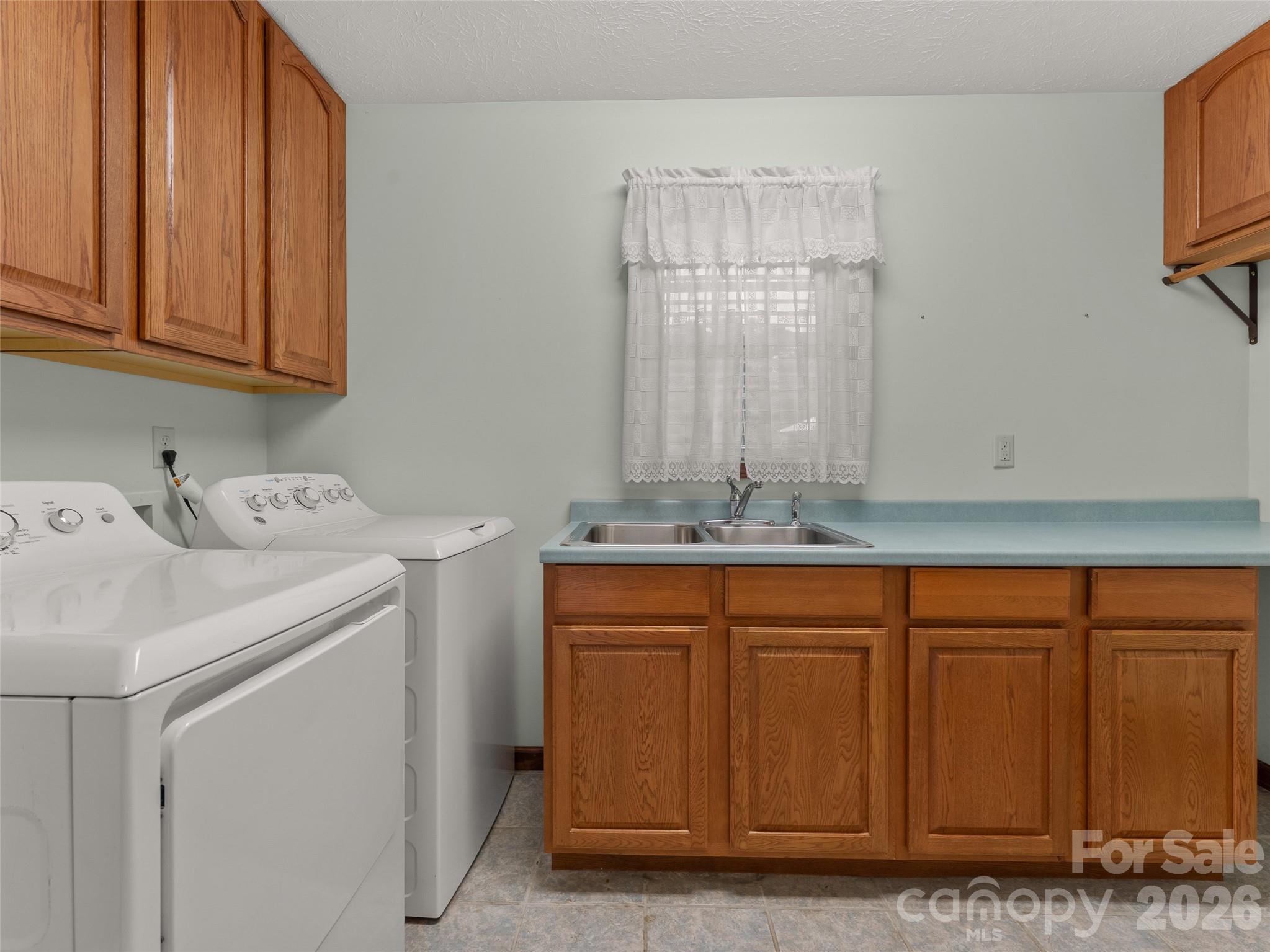 476 Jackson Loop Road Flat Rock, NC 28731 - Photo 14 of 34 a utility room with dryer and washer