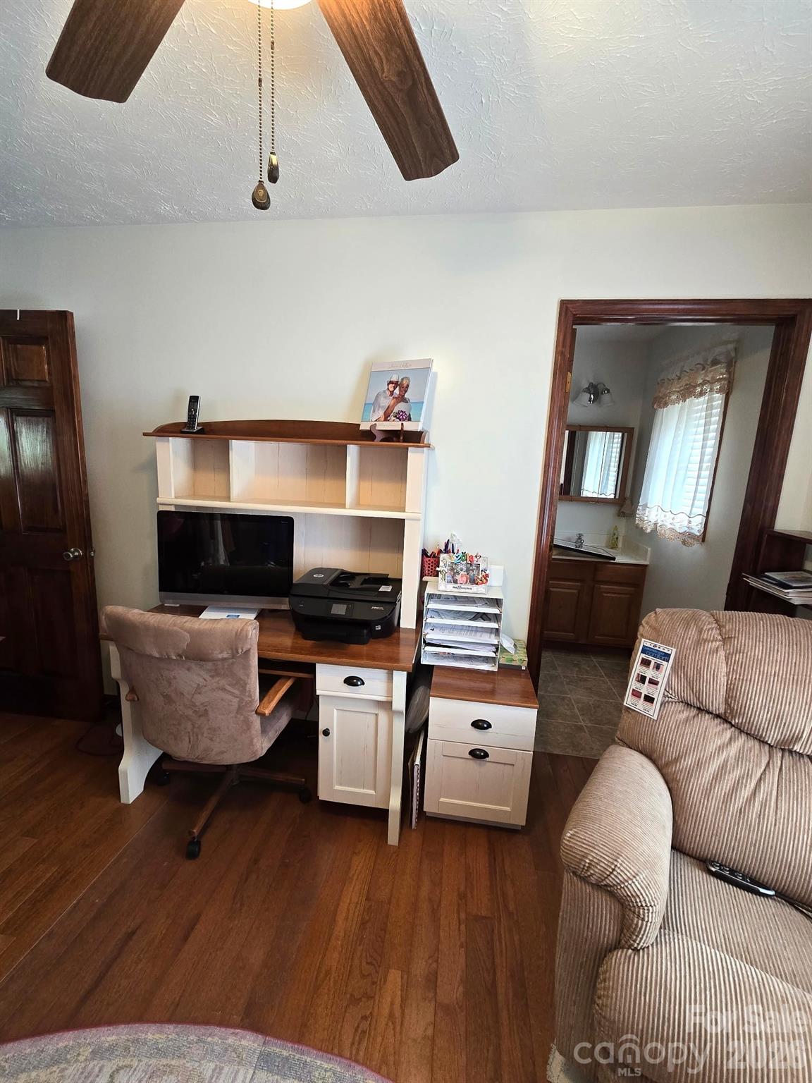 476 Jackson Loop Road Flat Rock, NC 28731 - Photo 17 of 37 a living room with furniture and a fireplace