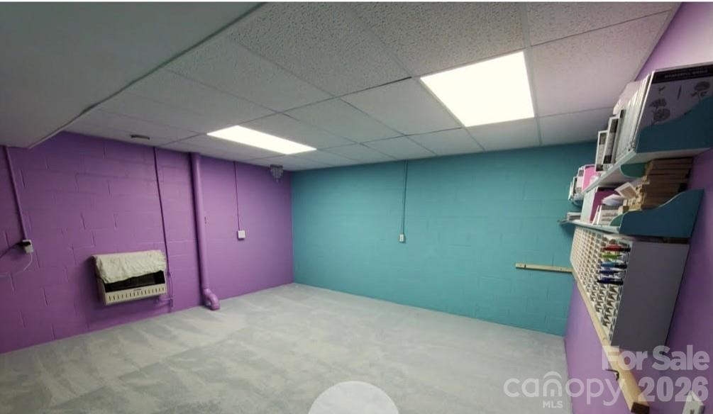 476 Jackson Loop Road Flat Rock, NC 28731 - Photo 23 of 37 a room with furniture and a potted plant