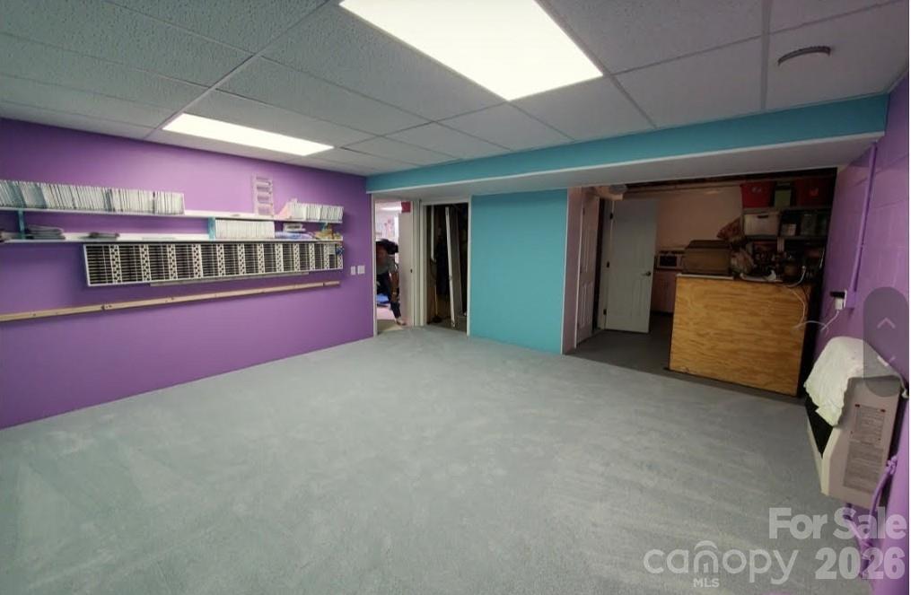 476 Jackson Loop Road Flat Rock, NC 28731 - Photo 24 of 37 a view of an empty room with a fireplace