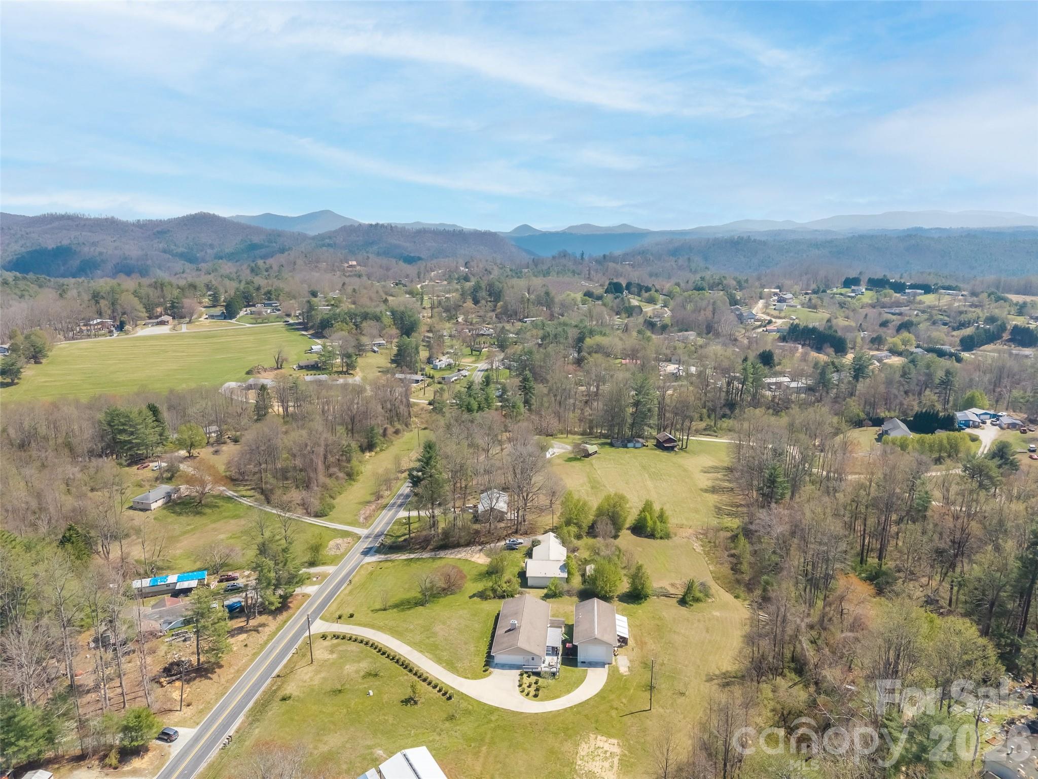 476 Jackson Loop Road Flat Rock, NC 28731 - Photo 33 of 34 an aerial view of residential houses with outdoor space