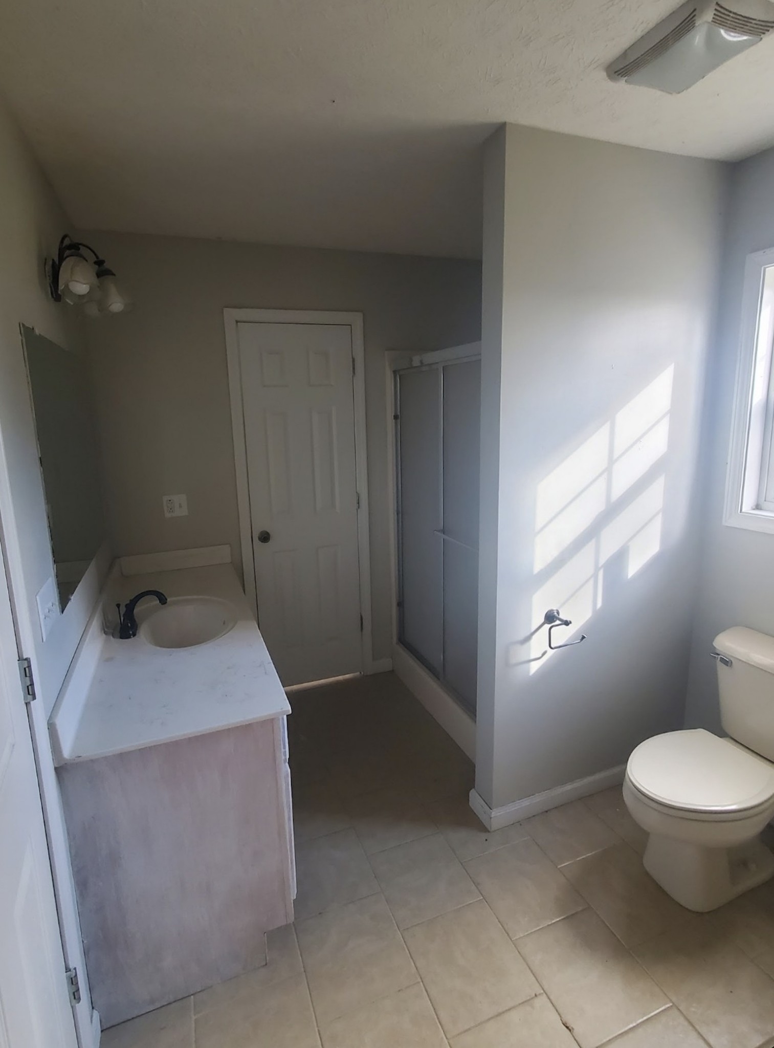 4259 Martins Chapel Road Springfield, TN 37172 - Photo 9 of 14 a bathroom with a sink toilet and window