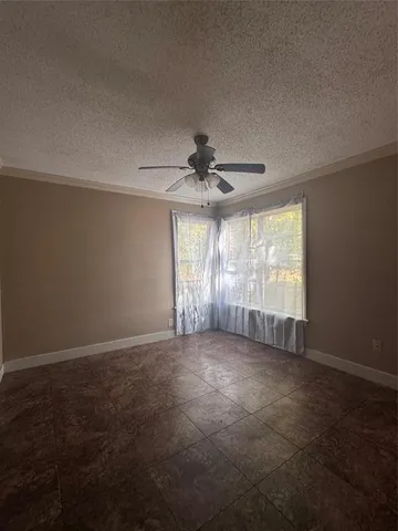 a kitchen with a cabinets and a stove top oven