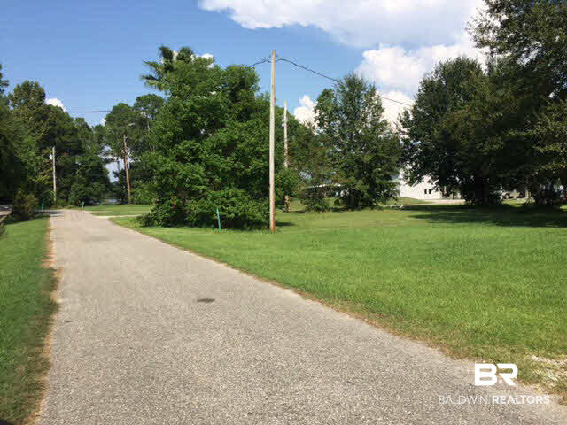 16400 The Loop Gulf Shores, AL 36542 - Photo 2 of 3 Side view of lot from The Loop