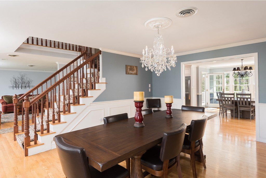 182 River Road Hanover, MA 02339 - Photo 11 of 29 a view of a dining room with furniture window and wooden floor