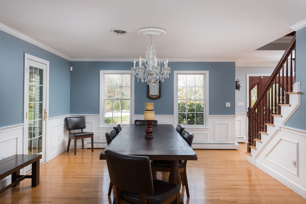 182 River Road Hanover, MA 02339 - Photo 12 of 29 a view of a dining room with furniture window and wooden floor