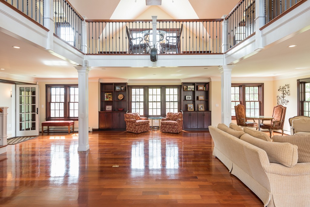 182 River Road Hanover, MA 02339 - Photo 18 of 29 a living room with furniture or chandelier and a wooden floor
