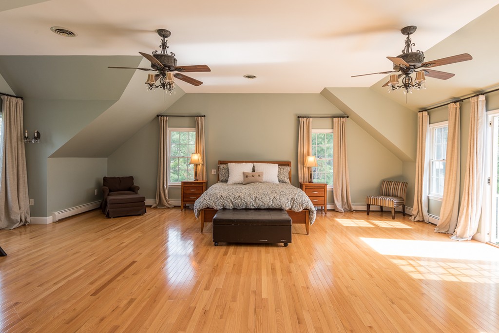 182 River Road Hanover, MA 02339 - Photo 19 of 29 a bedroom with a bed and wooden floor