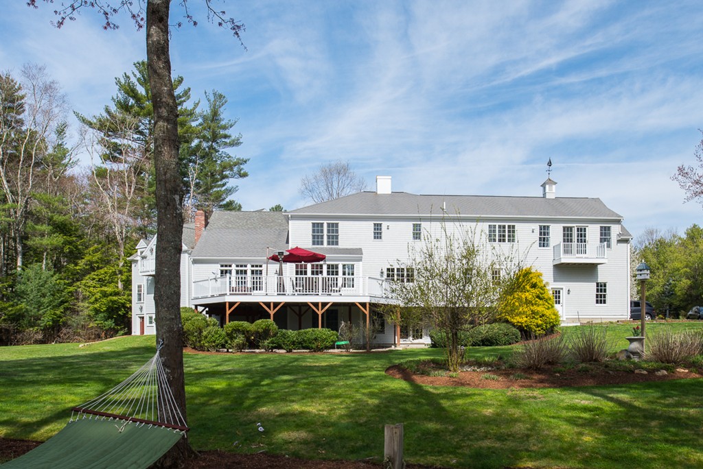 182 River Road Hanover, MA 02339 - Photo 26 of 29 a front view of house with yard and trees